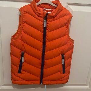 Hanna Andersson size 120 (6/7) orange puffer vest. Like new.